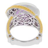 Oval purple amethyst sterling silver ring with elegant gold accents and detailed filigree design.